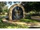 Attractive Country Club Village signage with lush green landscaping at 1364 Augusta National Blvd, Winter Springs, FL 32708