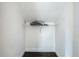Small closet space with wire shelving, offering storage solutions at 1504 Indiana Ave, St Cloud, FL 34769
