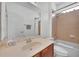 Cozy bathroom with vanity sink, soaking tub, and shower combination at 1560 Canopy Pasture Dr, St Cloud, FL 34771