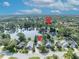 Aerial view of the property location, with lake views and surrounding community amenities at 172 Clear Lake Cir, Sanford, FL 32773