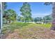Scenic backyard view overlooking the lake at 172 Clear Lake Cir, Sanford, FL 32773