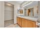 Bathroom featuring a large vanity with ample counter space and open closet at 172 Clear Lake Cir, Sanford, FL 32773