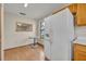 Eat in kitchen with white refrigerator, small table and window at 172 Clear Lake Cir, Sanford, FL 32773