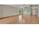 Bright, spacious living area with hardwood flooring and a light-filled atmosphere at 172 Clear Lake Cir, Sanford, FL 32773