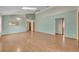 Spacious living room featuring wood floors, a skylight, and neutral paint at 172 Clear Lake Cir, Sanford, FL 32773