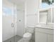 Modern bathroom featuring a glass enclosed shower and marble countertop vanity at 1760 Mondrian Cir, Winter Park, FL 32789