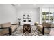 Cozy living room features neutral tones, contemporary art, and modern furniture at 1760 Mondrian Cir, Winter Park, FL 32789