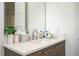 Bathroom vanity featuring a modern sink, stylish faucet, and sleek wood-tone cabinetry at 1781 Pine Ave, Winter Park, FL 32789
