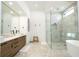 Bright bathroom featuring a glass shower and a stylish vanity at 1781 Pine Ave, Winter Park, FL 32789