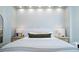 A bright bedroom with white walls, a large bed, and recessed lighting at 1781 Pine Ave, Winter Park, FL 32789