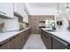 Modern kitchen with sleek cabinets, stainless steel appliances, and a spacious island at 1781 Pine Ave, Winter Park, FL 32789