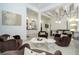 Elegant living room with modern furniture, stylish decor, and an open concept design at 1781 Pine Ave, Winter Park, FL 32789
