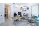 Modern office featuring neutral decor and large windows for an abundance of natural light and a view of the guitar room at 1781 Pine Ave, Winter Park, FL 32789