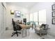 Bright and modern office featuring neutral decor and large windows for an abundance of natural light at 1781 Pine Ave, Winter Park, FL 32789