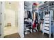 A modern walk-in closet providing ample storage and organization with access to an ensuite at 1781 Pine Ave, Winter Park, FL 32789