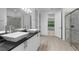 Elegant Primary bath featuring a double vanity with vessel sinks, a glass shower, and seamless access to the bedroom at 1812 Stoneywood Way, Apopka, FL 32712