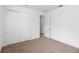 Simple bedroom features plush carpeting and ample closet space at 1812 Stoneywood Way, Apopka, FL 32712