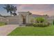 Charming single-story home featuring a well-manicured lawn and attached two-car garage at 1812 Stoneywood Way, Apopka, FL 32712