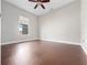 Bedroom featuring a ceiling fan and window providing plenty of natural light at 19562 Majestic St, Orlando, FL 32833