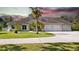 Beautiful single story home with a spacious driveway and three car garage at 19562 Majestic St, Orlando, FL 32833