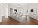 Bright, neutral living room with ample seating, stylish decor, and sliding doors at 19562 Majestic St, Orlando, FL 32833