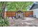View of a chicken coop in a fenced in backyard at 2105 Ne 50Th Pl, Ocala, FL 34479