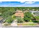 An aerial view of the property showcasing the roof, landscaping and surrounding neighborhood at 217 Lake Cassidy Dr, Kissimmee, FL 34759
