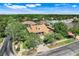 Aerial view of a home with beautiful landscaping and neighborhood on a sunny day at 217 Lake Cassidy Dr, Kissimmee, FL 34759