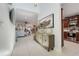 Open foyer with tiled floors leading into the living room and kitchen at 217 Lake Cassidy Dr, Kissimmee, FL 34759