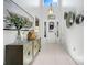 Bright foyer with high ceilings and a decorative console table at 217 Lake Cassidy Dr, Kissimmee, FL 34759