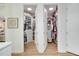 Organized walk-in closet with custom shelving and ample storage space at 217 Lake Cassidy Dr, Kissimmee, FL 34759