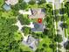 Neighborhood aerial view showcasing lush landscaping, convenient sidewalks, and a prime location at 2308 Bur Oak Ct, Oviedo, FL 32766