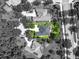 Neighborhood aerial view showcasing lush landscaping, convenient sidewalks, and a prime location at 2308 Bur Oak Ct, Oviedo, FL 32766