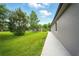 Enjoy a meticulously maintained backyard with mature trees and lush landscaping at 2308 Bur Oak Ct, Oviedo, FL 32766
