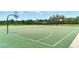 Well-maintained basketball court with clear lines, providing an excellent space for sports and recreation in the community at 2308 Bur Oak Ct, Oviedo, FL 32766