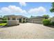 Well maintained home with a paver driveway and a three car garage at 2308 Bur Oak Ct, Oviedo, FL 32766