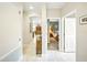 Hallway with access to the Primary bedroom and living room at 2308 Bur Oak Ct, Oviedo, FL 32766