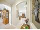 Hallway featuring decor, views of living room and furniture at 2308 Bur Oak Ct, Oviedo, FL 32766