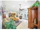 Expansive living room with tile floors, and views of the kitchen, seating area, and access to the outdoors at 2308 Bur Oak Ct, Oviedo, FL 32766