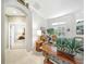 Spacious living room with tiled flooring, arched entryway and an abundance of natural light at 2308 Bur Oak Ct, Oviedo, FL 32766