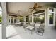 This screened in patio area is ideal for relaxing or entertaining guests at 2308 Bur Oak Ct, Oviedo, FL 32766