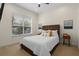 Bedroom featuring a queen bed, natural light from a window and neutral colors at 2456 Northumbria Dr, Sanford, FL 32771