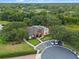 Aerial view of the community pool and clubhouse in a lushly landscaped neighborhood at 2456 Northumbria Dr, Sanford, FL 32771