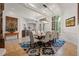 Formal dining room with stylish lighting, neutral colors, and seating for eight at 2456 Northumbria Dr, Sanford, FL 32771