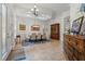 Formal dining room with stylish lighting, neutral colors, and seating for eight at 2456 Northumbria Dr, Sanford, FL 32771