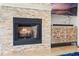 Stone fireplace with mantel and hearth, adding warmth and charm to the living space at 2456 Northumbria Dr, Sanford, FL 32771