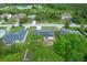 A residential street with well maintained houses and mature trees, in a quiet neighborhood at 2626 Coachman Dr, Deltona, FL 32738
