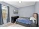 Small bedroom with tile flooring and a dresser located near the window at 2626 Coachman Dr, Deltona, FL 32738