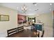 Spacious open-concept living area with dining room, kitchen, and sliding door access to backyard at 2626 Coachman Dr, Deltona, FL 32738