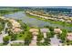 Aerial view of the property highlighting its lakefront location and well-manicured lawn at 2631 Captains Ct, Kissimmee, FL 34746